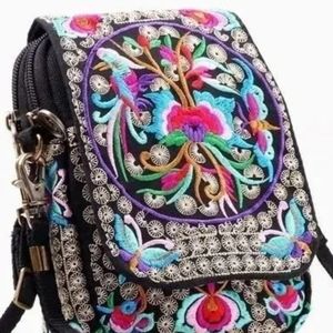 Embroidered crossbody bag.